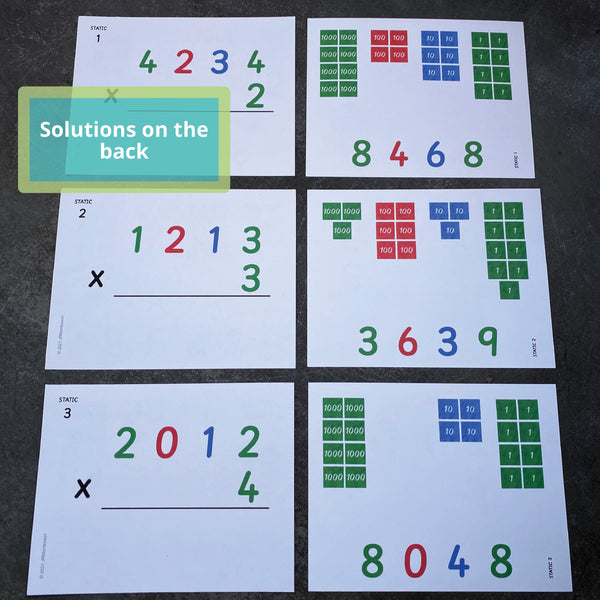 JRMontessori multliplication task cards with full place value color on the front and colorful stamp game stamps on the back